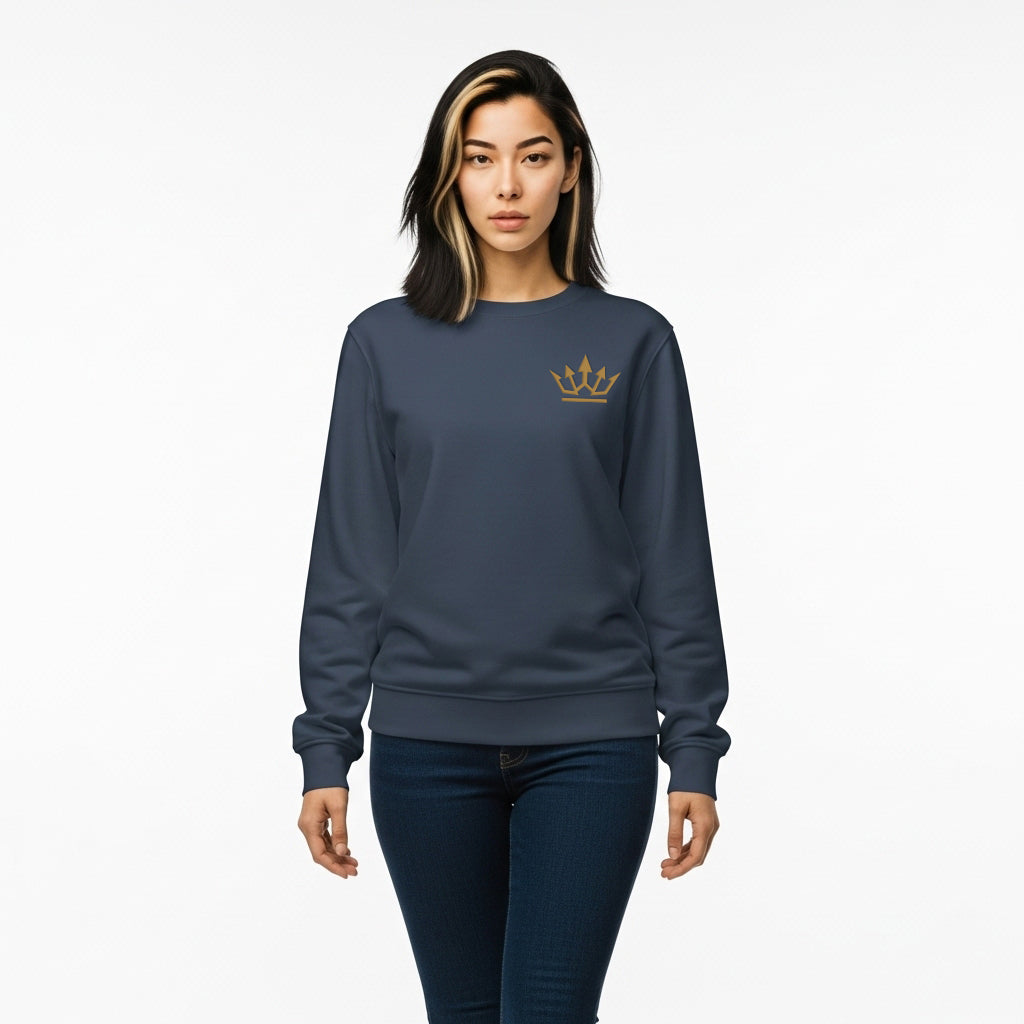 Woman wearing a navy blue sweatshirt with a gold crown logo on a white background